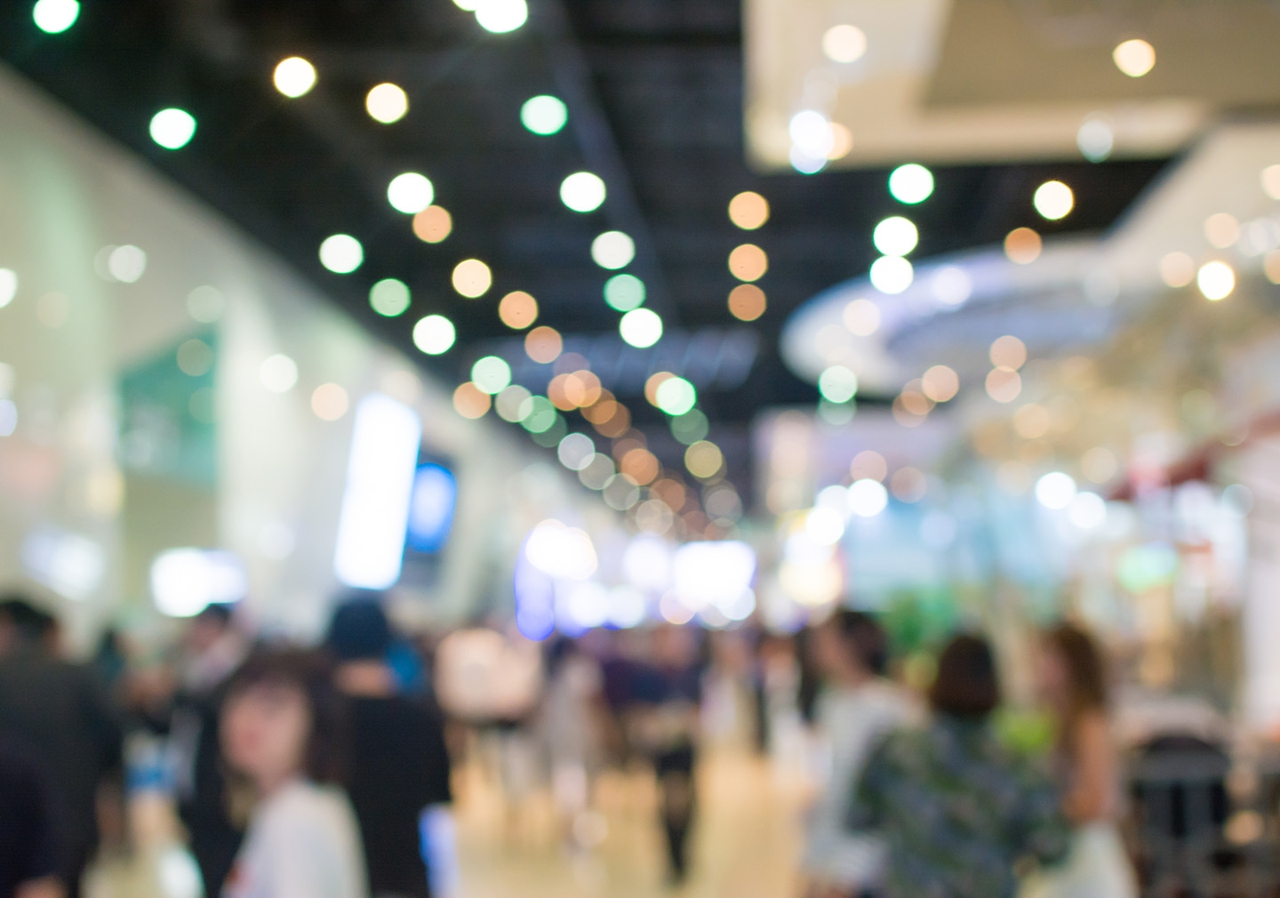 Out-of-focus image of an expo hall at a conference