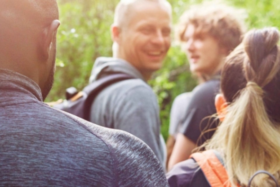 People on a hike through the woods